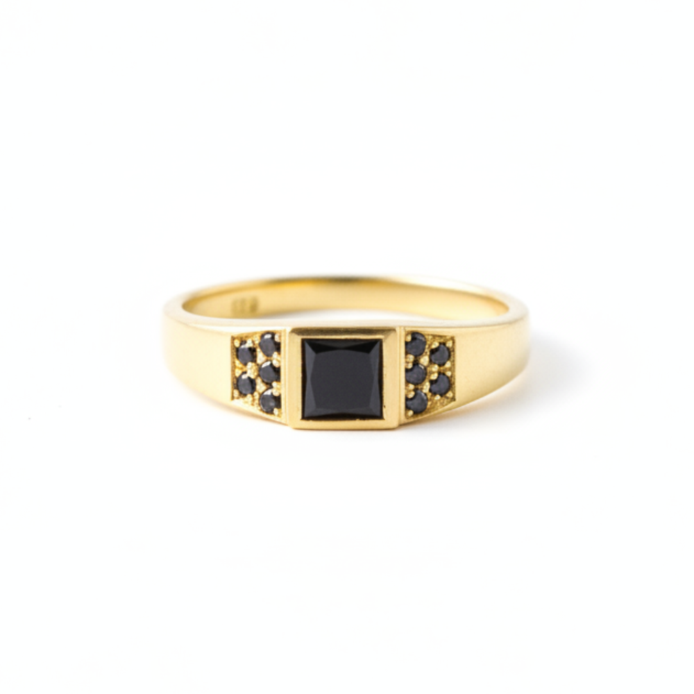 Gold ring with black diamonds